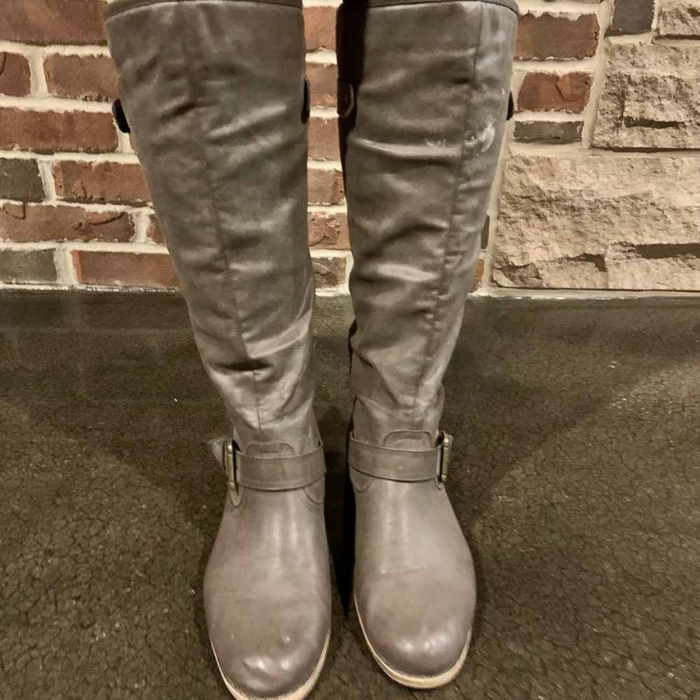 Women’s blowfish knee high boots.